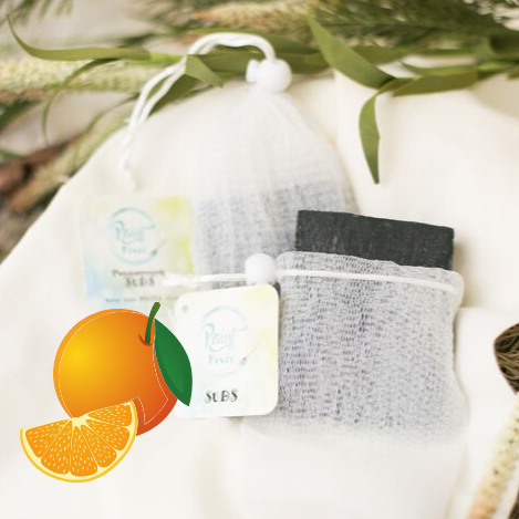 Product set with 'Orange Sunshine' branding on a black background