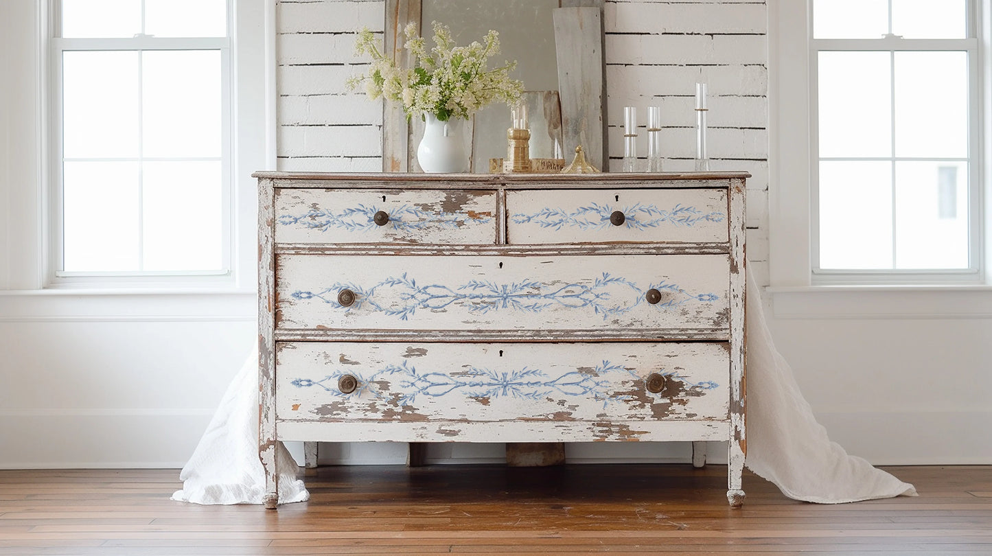 Vintage-style dresser with floral patterns in a bright room