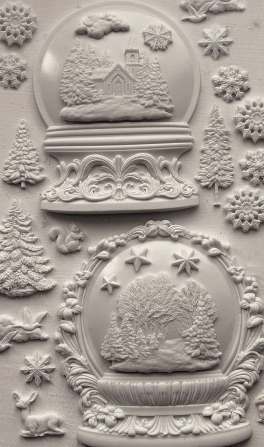 Decorative clay castings of snow globes and winter elements