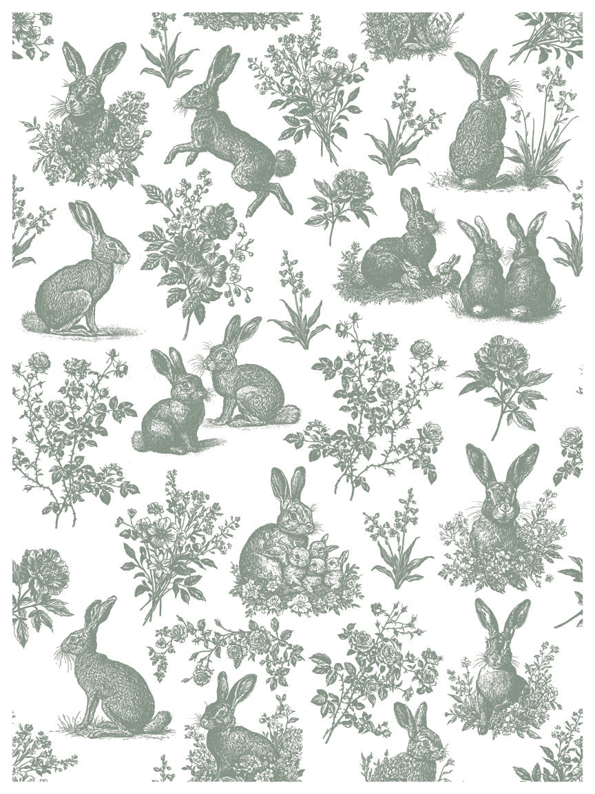 An inlay page from IOD's 'Spring Melody', with rabbits, bunnies, and flowers in a soft green color.