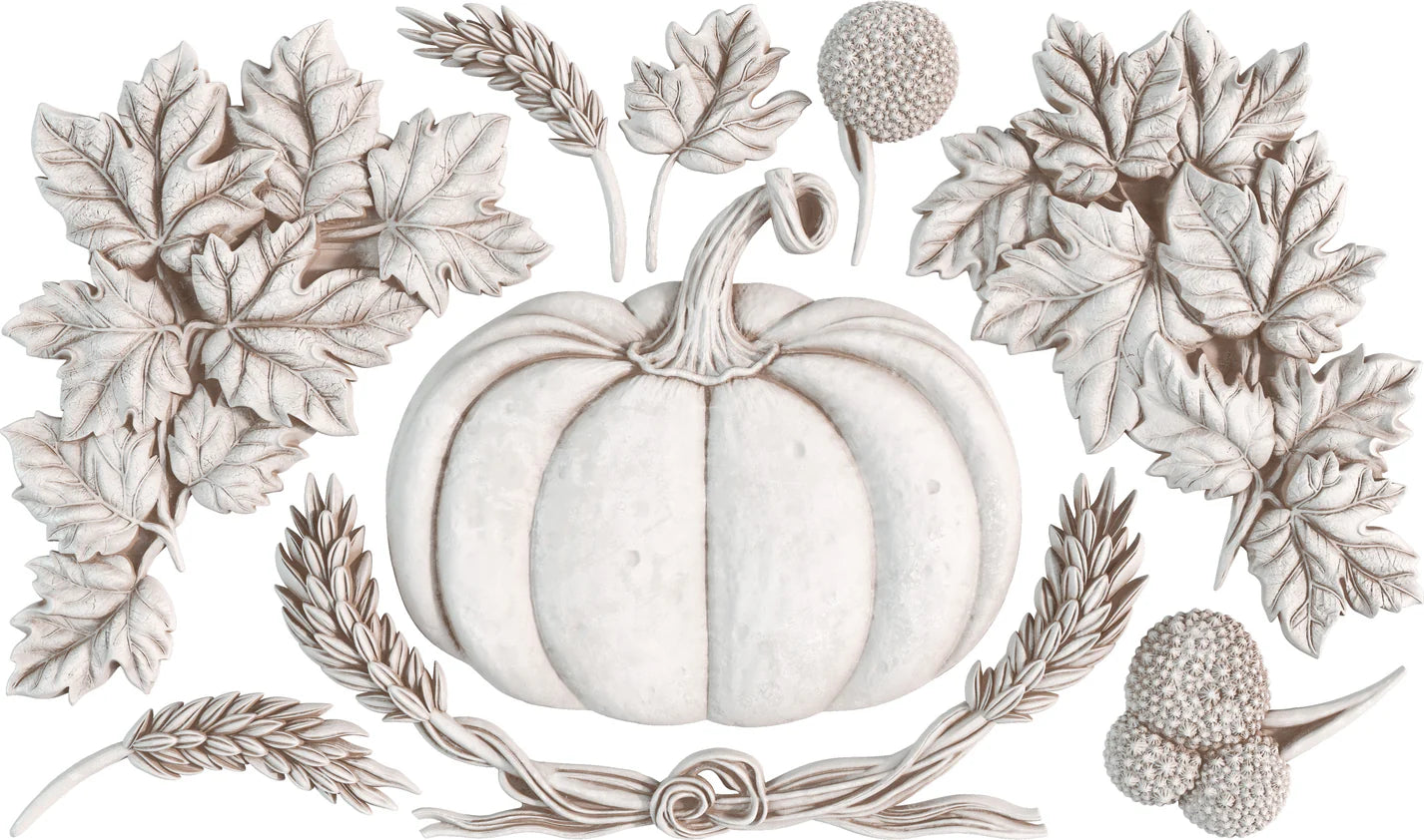 Clay castings from the IOD Autumn Cottage mould, featuring a pumpkin and fall leaves.