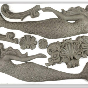 A set of casted mermaids with marine life motifs, created from the Sea Sisters Mould by IOD.