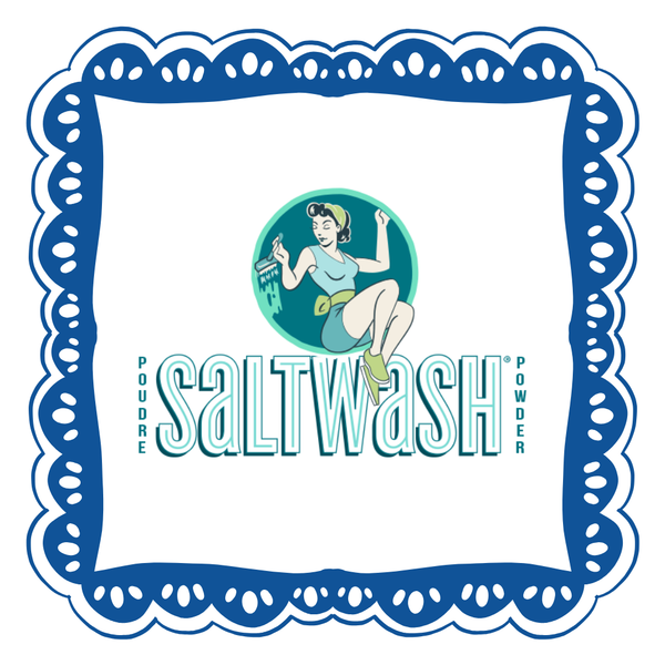 A logo for "Saltwash Powder" surrounded by a blue frame.