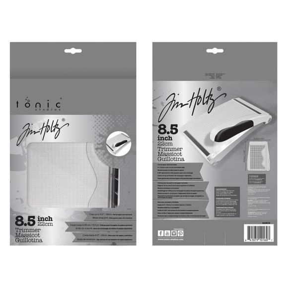 Two packaging designs for Tim Holtz 8.5 inch trimmer, one with a close-up of the product and the other with text and branding.