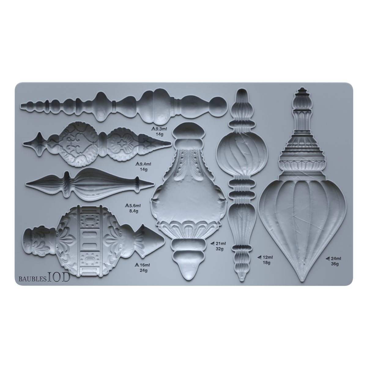 A gray silicone mold tray featuring multiple ornate architectural finial and decorative relief designs, with printed measurements and weights in French. The brand name 'BAUBLES IOD' is visible in the bottom-left corner.