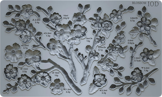 A gray-colored mould called 'Blossom' with a design of cherry blossom flowers and branches.
