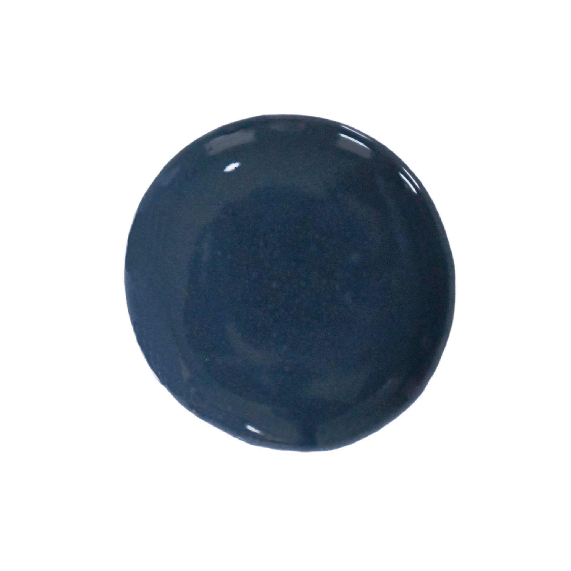 Blue dollop of blue milk paint on a white background