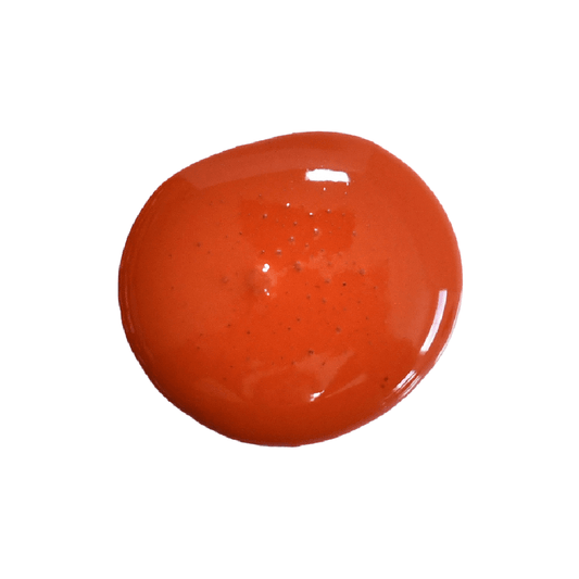 A swatch of milk paint in the shade “Red Wagon” against a white background.