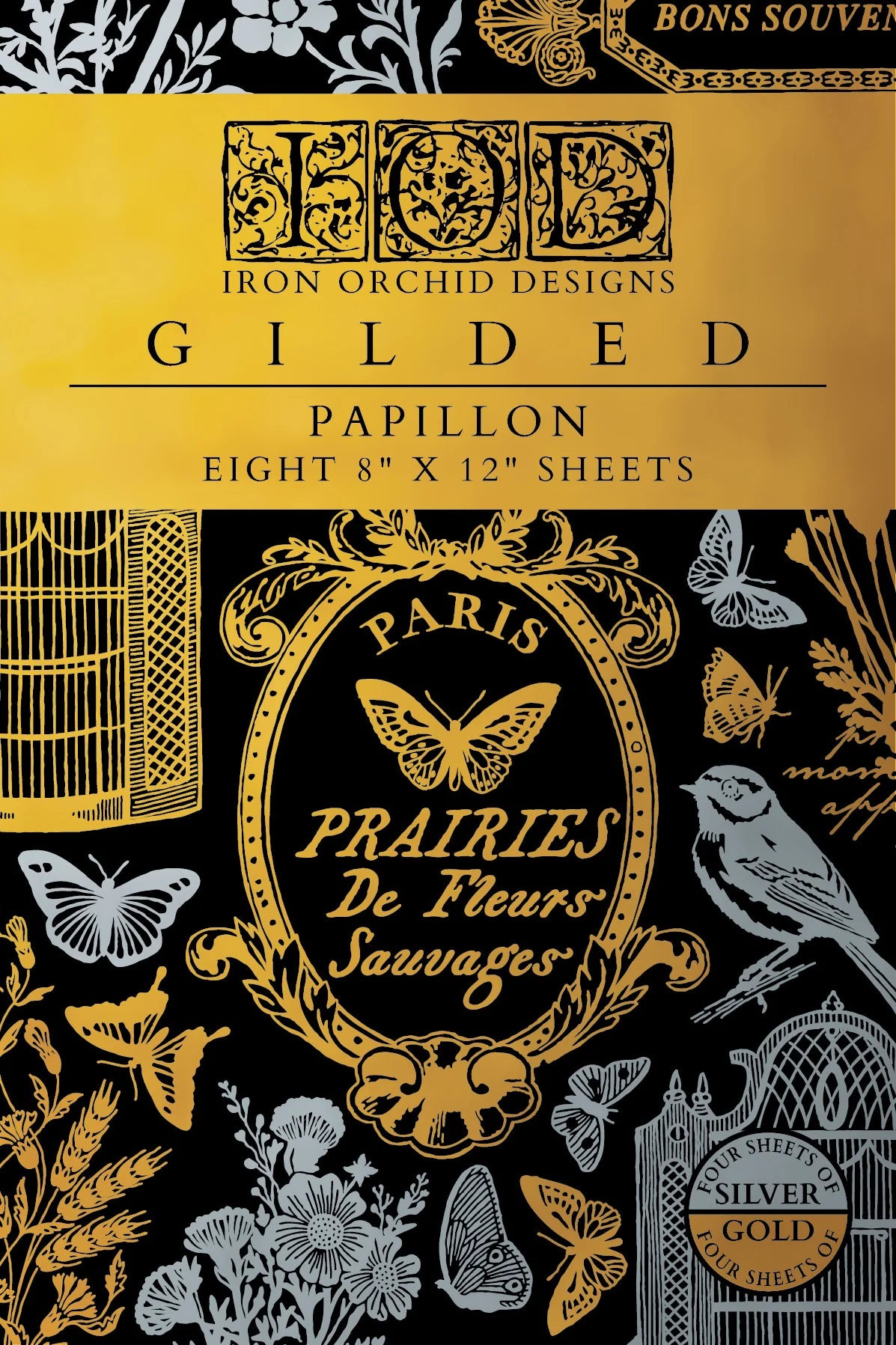 Gilded Papillon transfer pad with floral and butterfly patterns on a black background