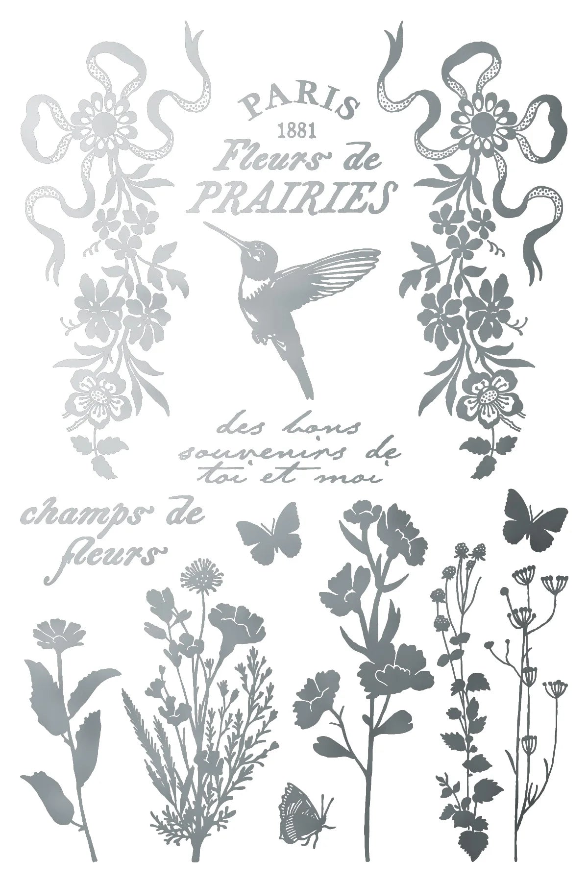 Decorative silver transfer design with floral elements, a hummingbird, and text in gray on a white background.