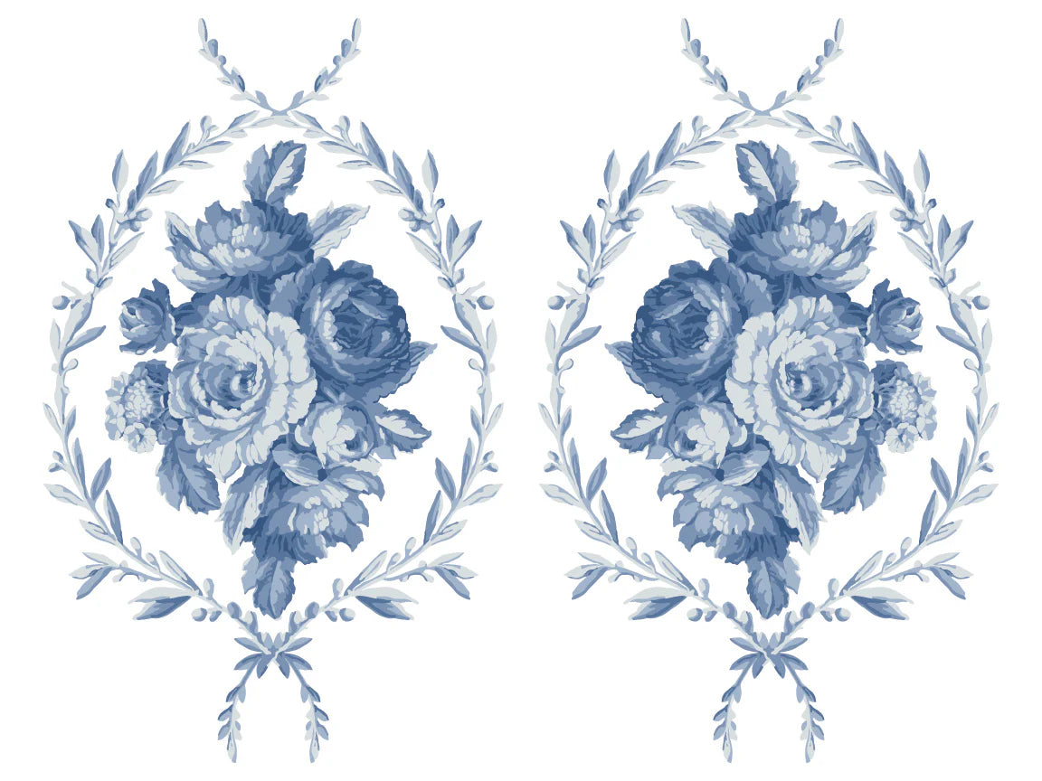 Two floral designs with blue roses and leaves on a white background
