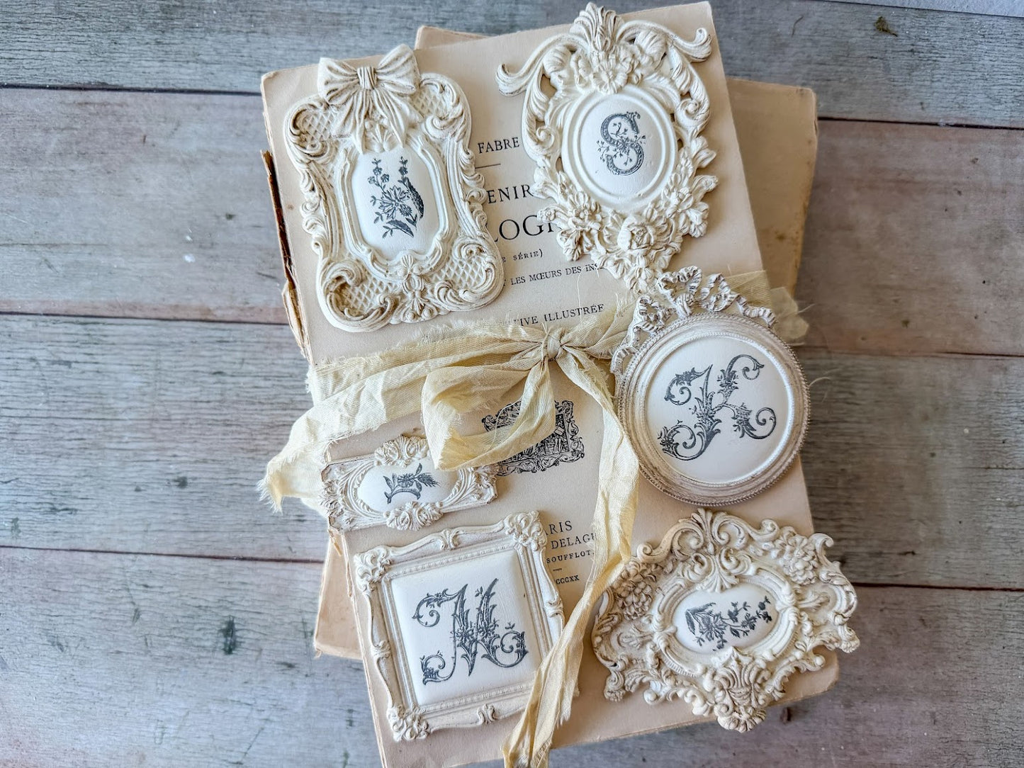 Decorative items with ornate designs on a rustic wooden surface