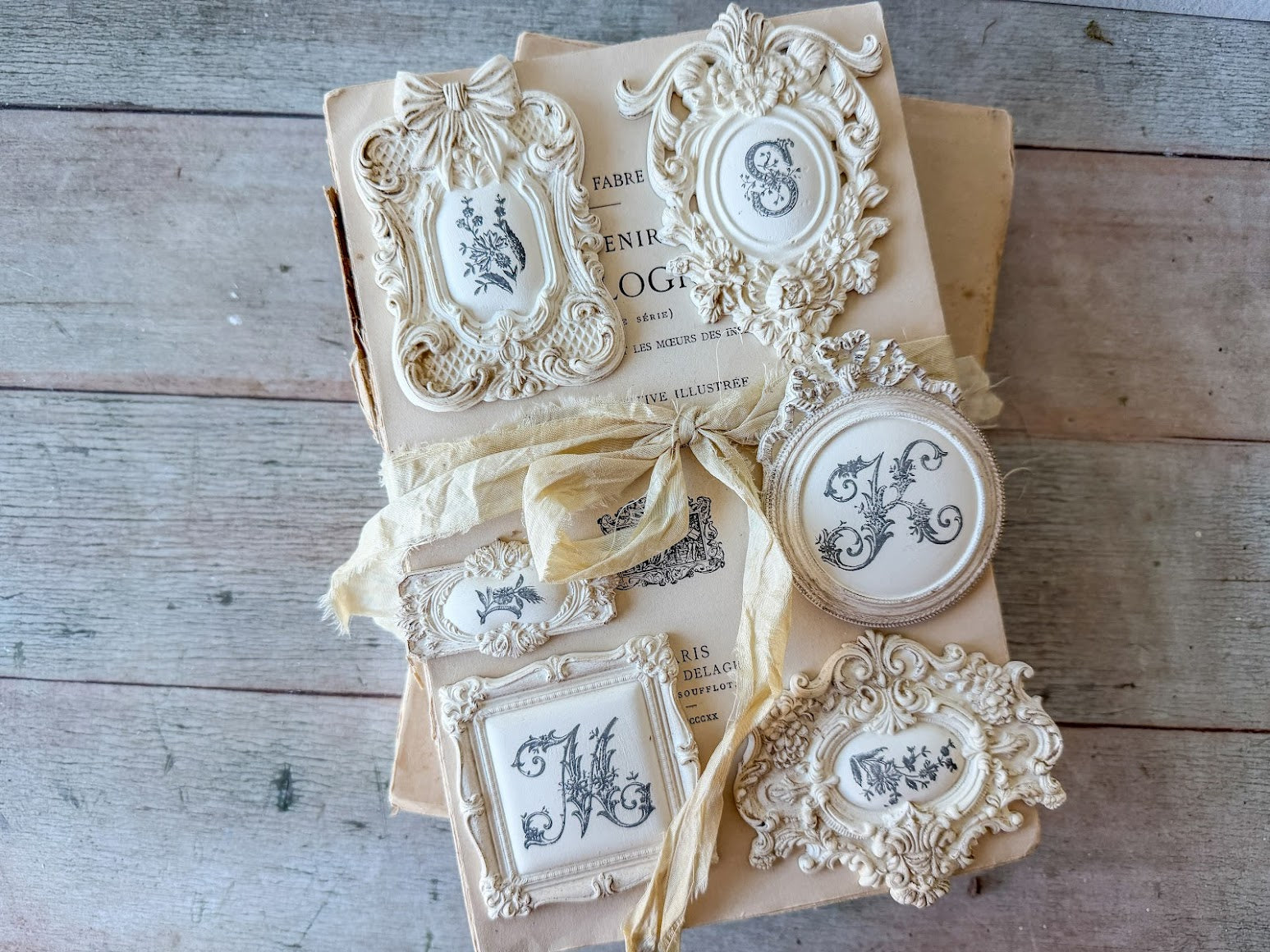 Decorative items with ornate designs on a rustic wooden surface