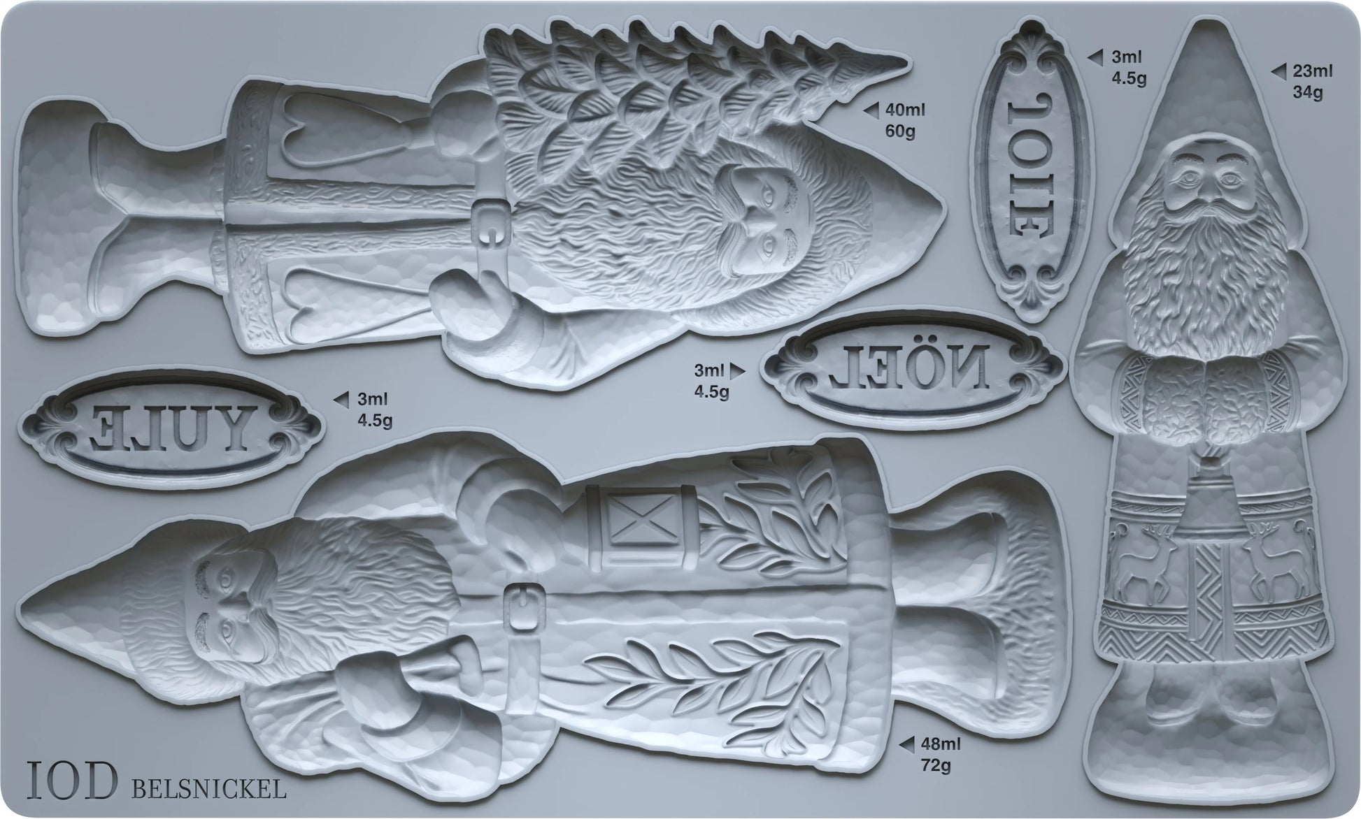 A silver silicone mold set featuring multiple Christmas-themed cavities, including large Santa Claus figurines and several small labeled pieces with measurements and names like JOIE, YULE, and NOEL.