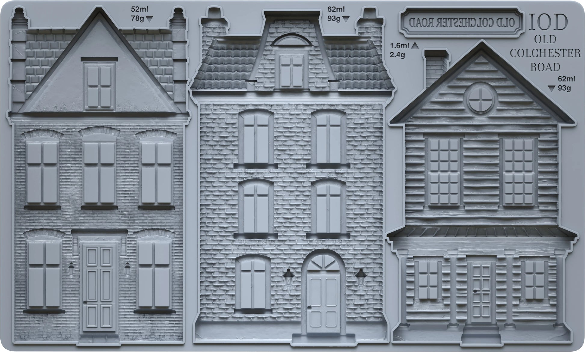 Three gray miniature house moulds or relief designs shown side by side, with printed text reading 'IOD OLD COLCHESTER ROAD' and small measurements above each building.