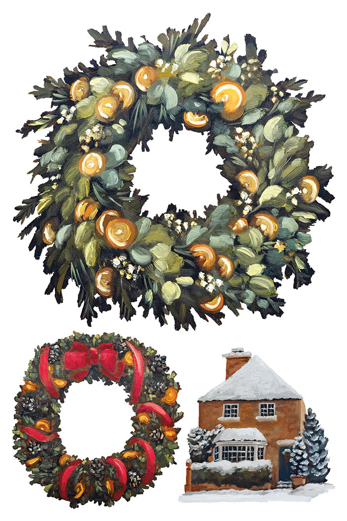 A  transfer paper featuring watercolor-style holiday illustrations showing two Christmas wreaths and a small snow-covered house. The top wreath is dense with green foliage and orange-gold ornaments, and the bottom wreath has greenery with red ribbons and orange-gold accents.