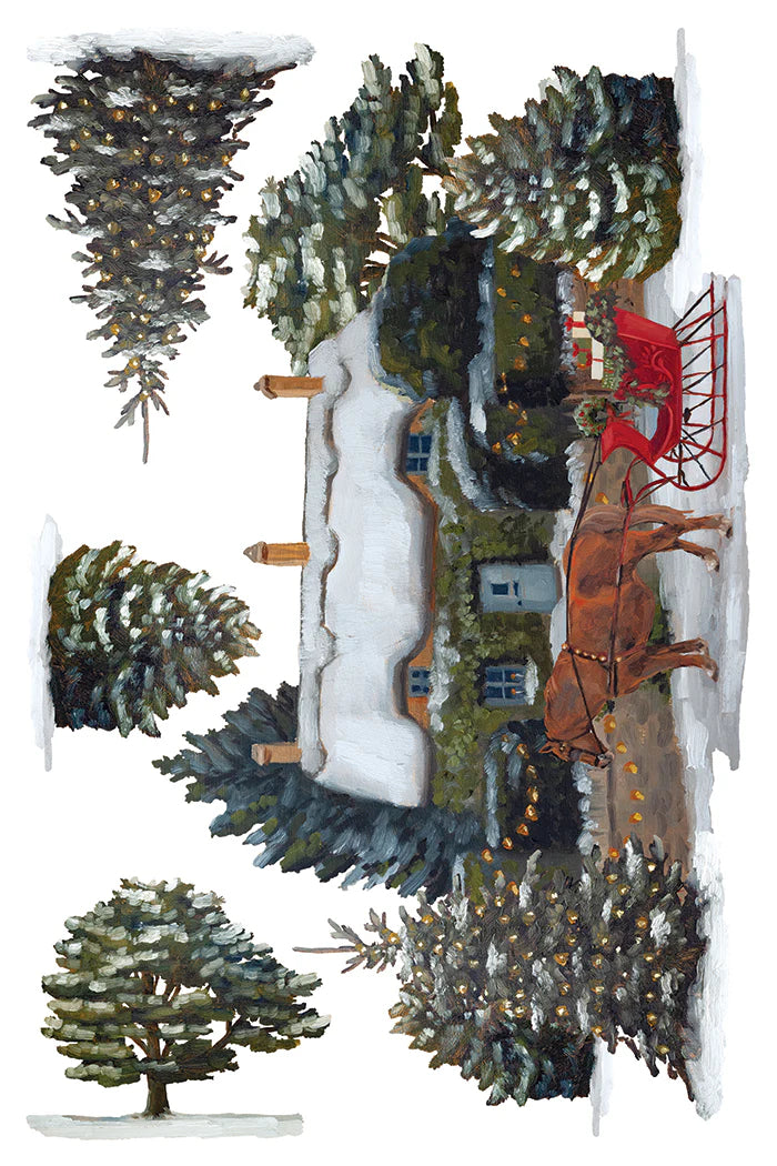 A transfer paper featuring a winter village scene with snow-covered evergreen trees, a small cottage, and a red sleigh drawn by a brown horse on a white background.