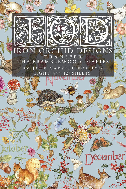 Front cover of a transfer pad featuring autumn and woodland illustrations, labeled 'IOD Iron Orchid Designs Transfer The Bramblewood Diaries' with months October, November, and December visible.