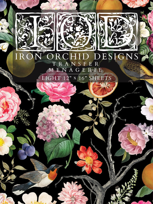 A decorative transfer pad with floral and animal patterns, including birds and botanicals