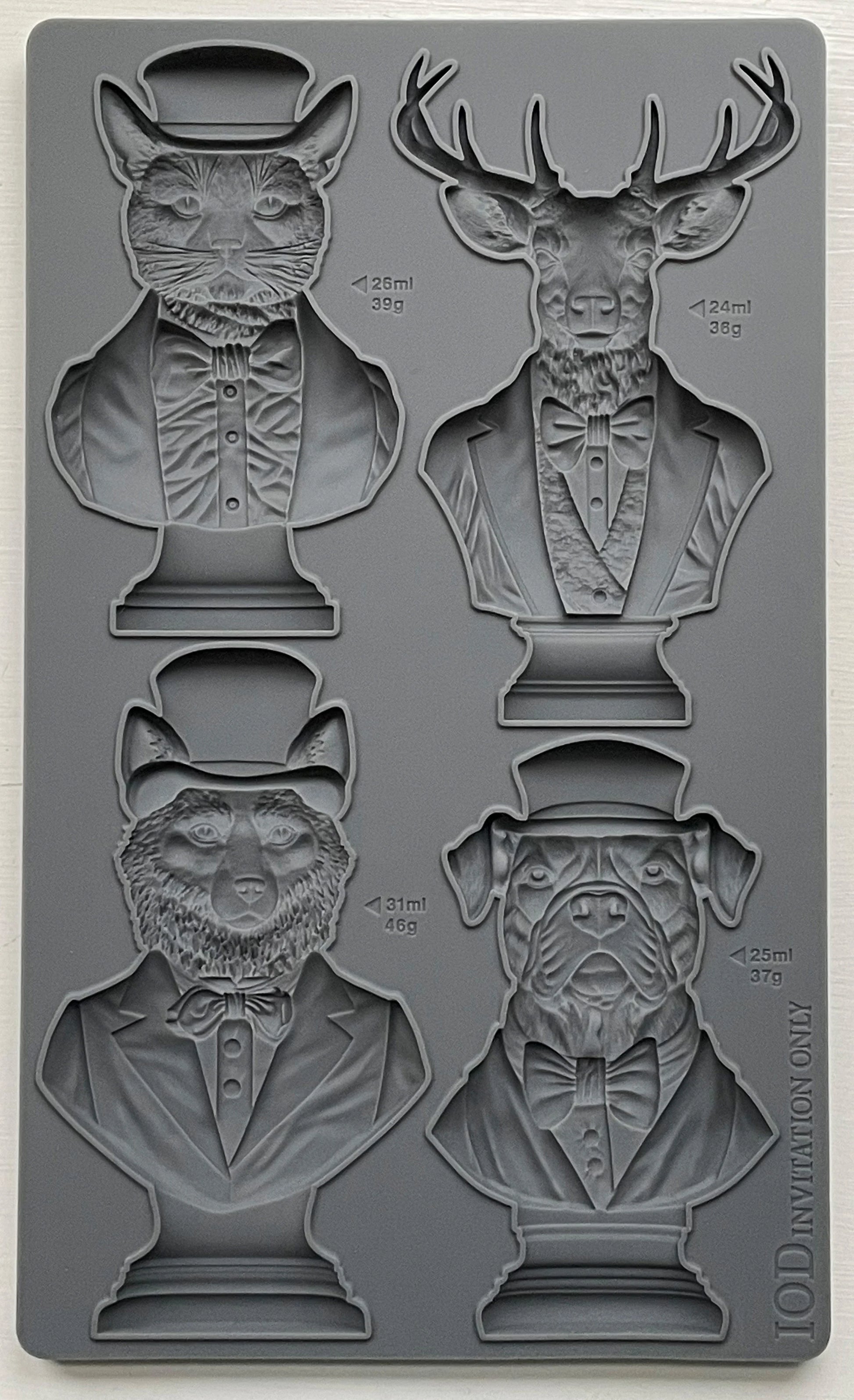 A set of four animal molds including a cat, deer, and dog, designed in a whimsical style with decorative elements, part of the IOD Decor Mould, 'Invitation Only'.