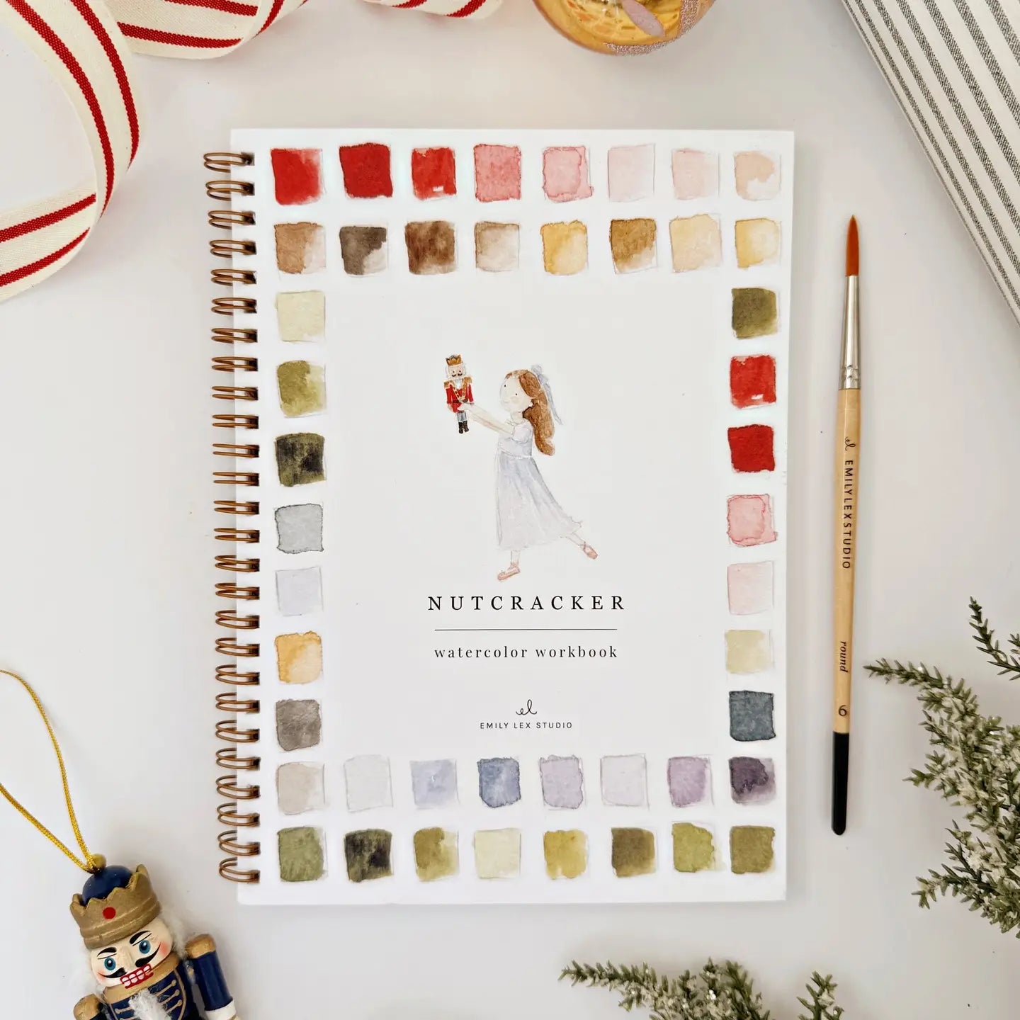 Nutcracker watercolor workbook cover showing festive holiday design