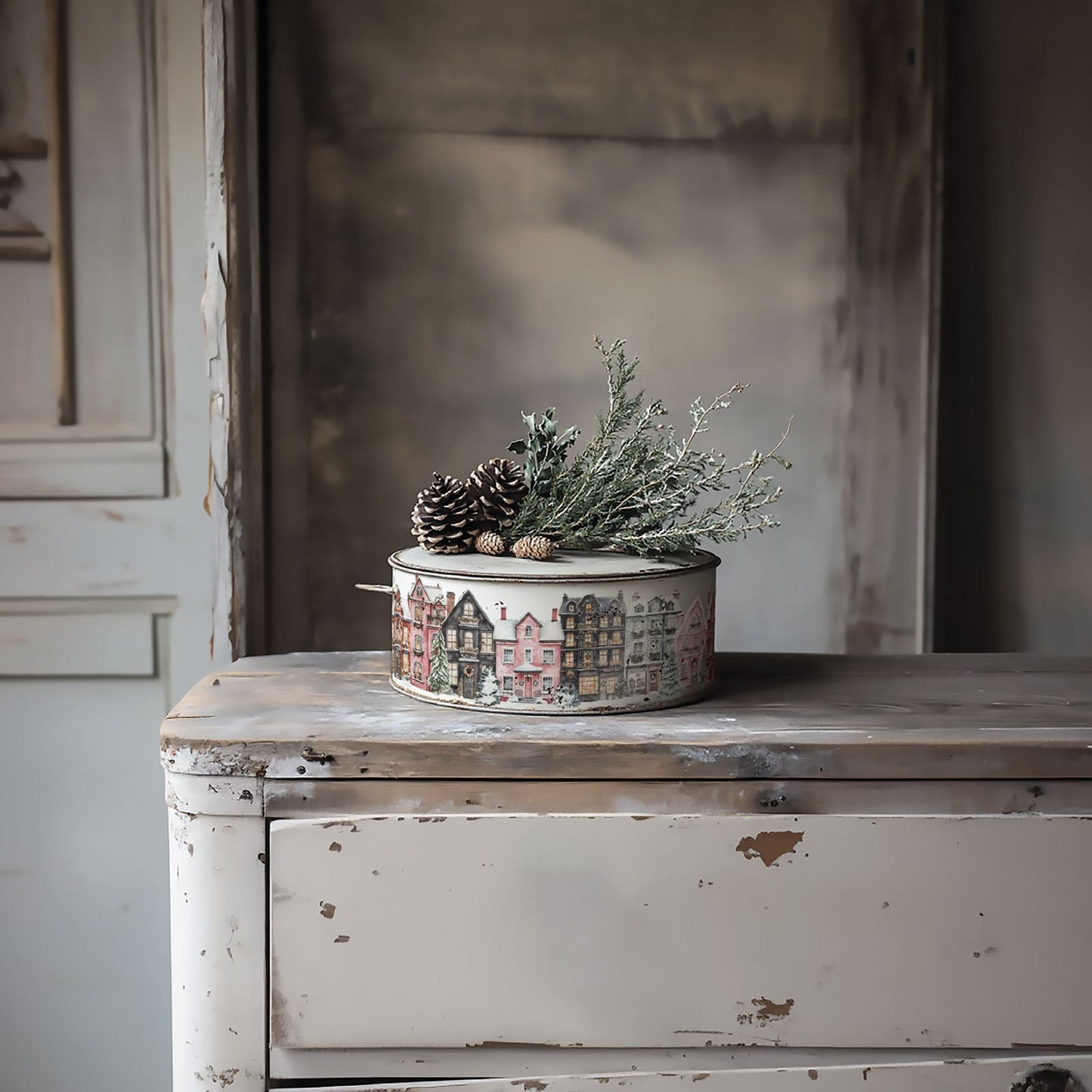 Decorative container with plants on a rustic wooden surface, decorated with the "Partridge Lane" transfer paper from "Iron Orchid Designs"