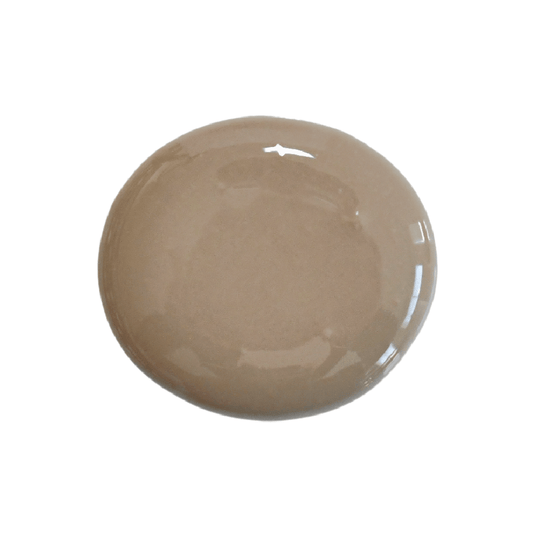 A swatch of beige milk paint in the shade “Suitcase” up against a white background.