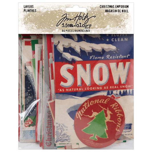 Packaging of Tim Holtz Idea-ology snow product with vintage design elements.