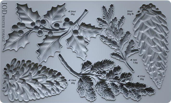 Mold from IOD with holly, pine cones, and pine needles