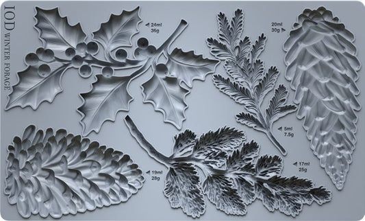 Mold from IOD with holly, pine cones, and pine needles