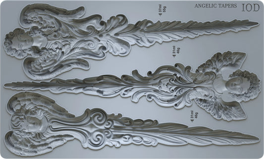 A set of three angelic taper moulds, with intricate designs, including an angel bust and icicle-like details.