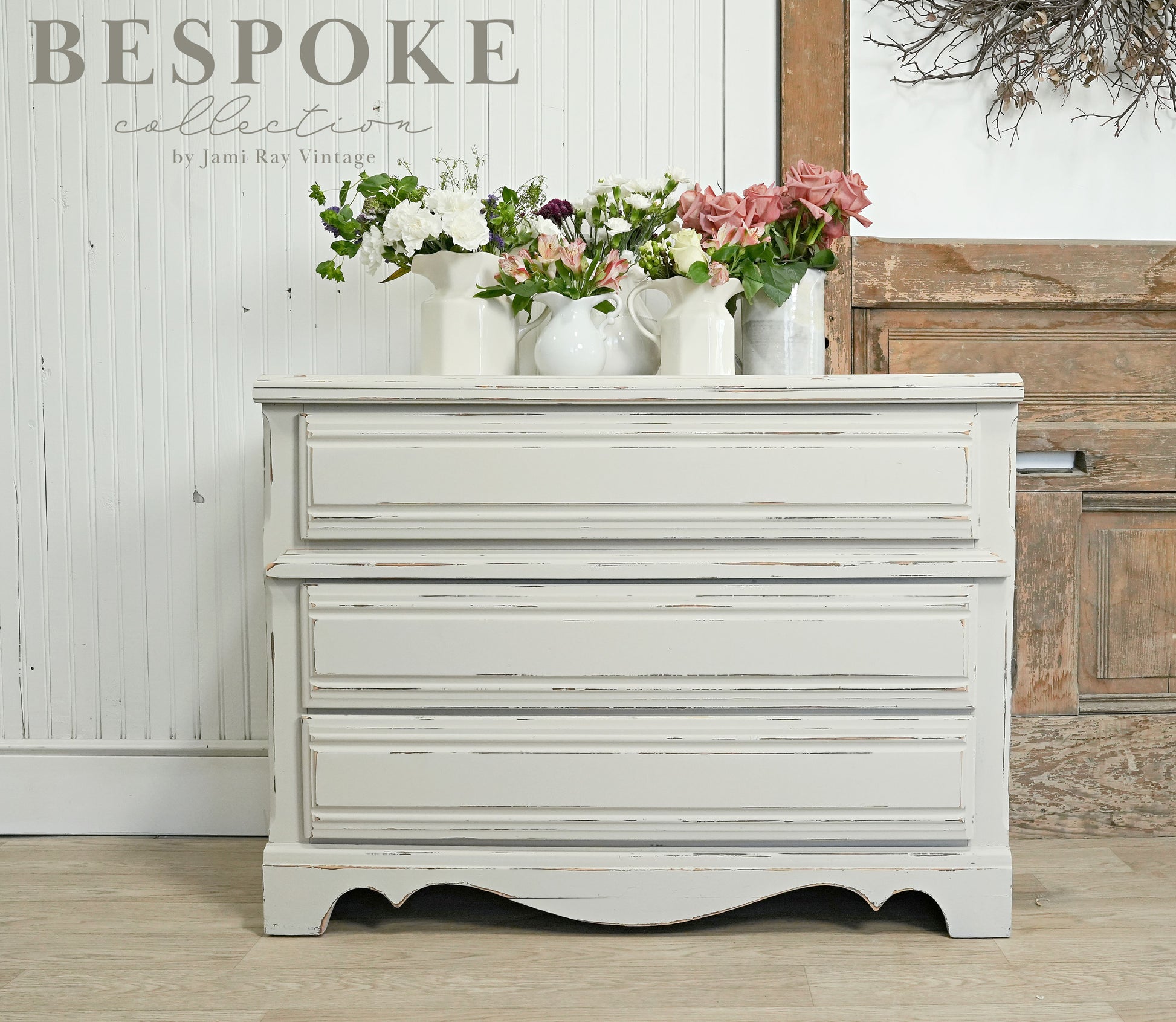Antique white dresser with floral decor, part of the Bespoke collection by Jami Ray Vintage.