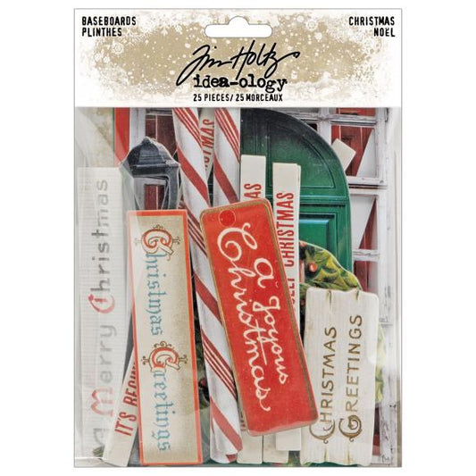 Packaged Christmas-themed decorative elements with text and patterns, featuring Tim Holtz brand.