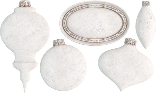 A set of white, ornament-shaped molds designed for crafting holiday decorations with a vintage aesthetic.