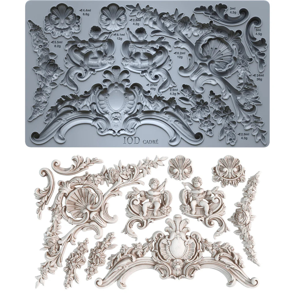 Decorative mold with intricate designs and matching decorative elements on a white background