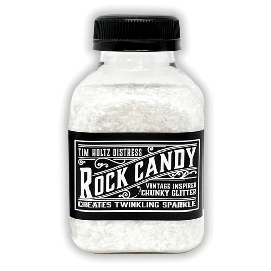 Bottle of Tim Holtz Distress Rock Candy chunky glitter on a white background