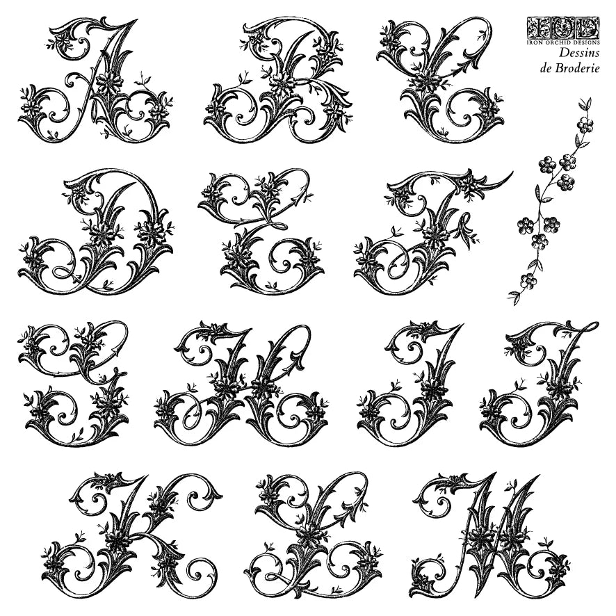 Stamp with decorative black letters A to M on a white background with 'Devisins de Broderie' branding.