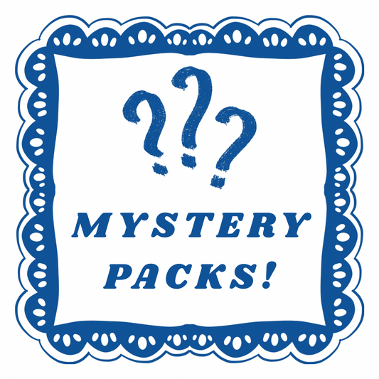 Decorative sign with question marks and 'Mystery Packs!' text on a white background