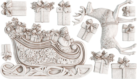 Clay casted in the shape of Santa's sleigh, reindeer, and Christmas presents against a transparent background.