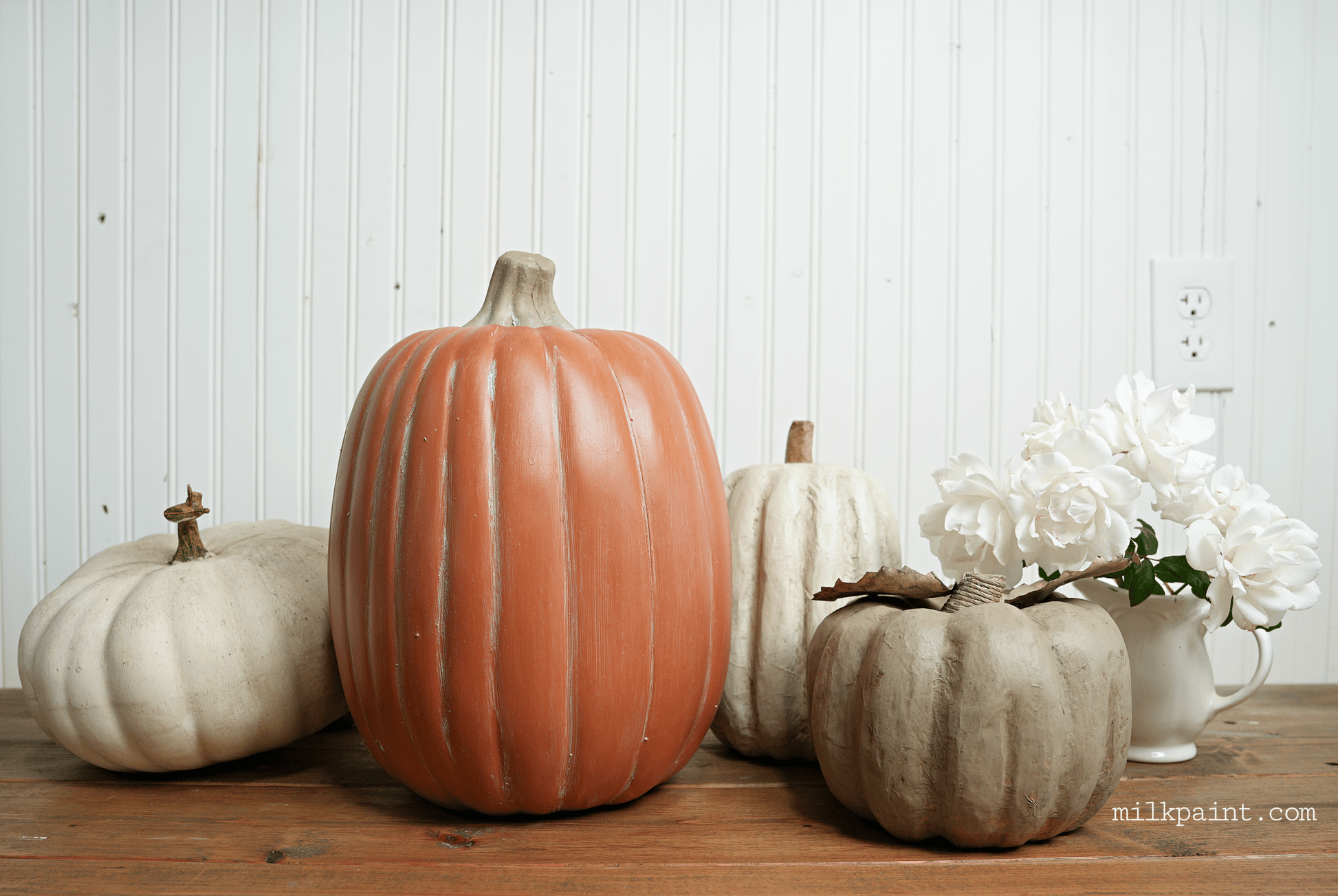 A craft pumpkin painted with milk paint in the shade "Sweet Potato".