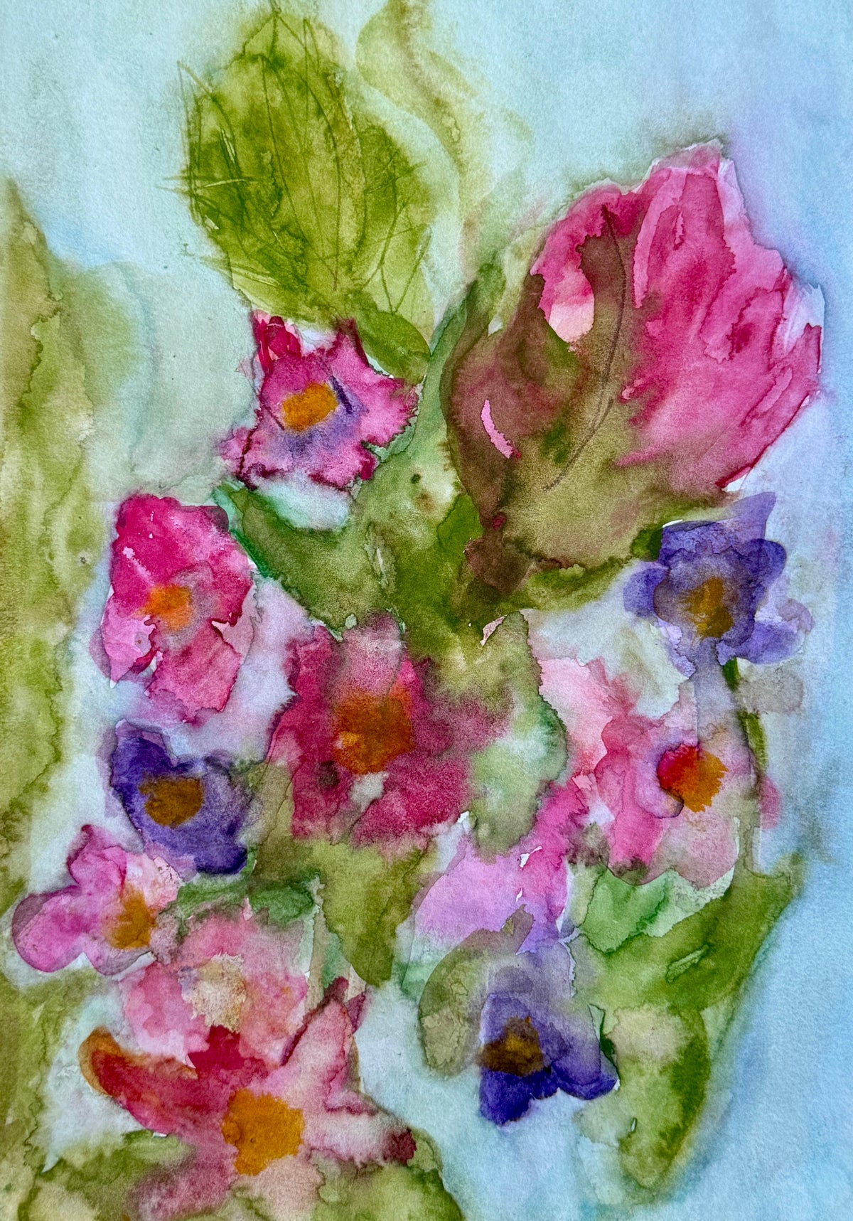 Watercolor painting of pink and purple flowers with green leaves on a light blue background.