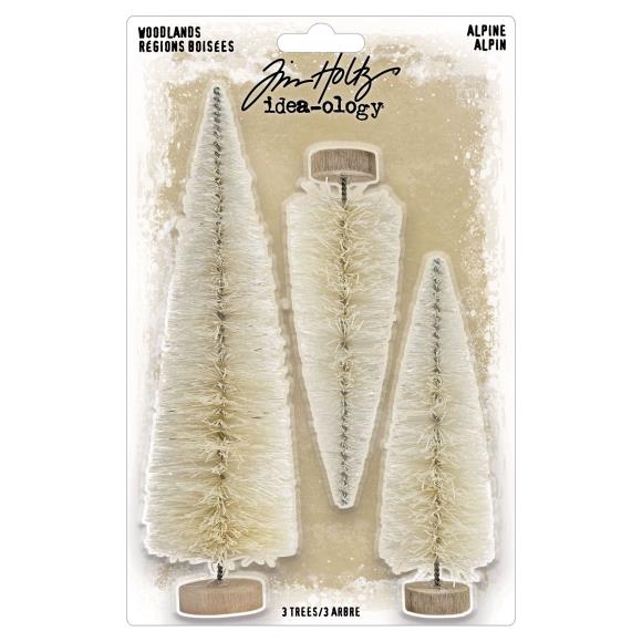 Three decorative trees in a packaging with Tim Holtz Idea-ology branding.