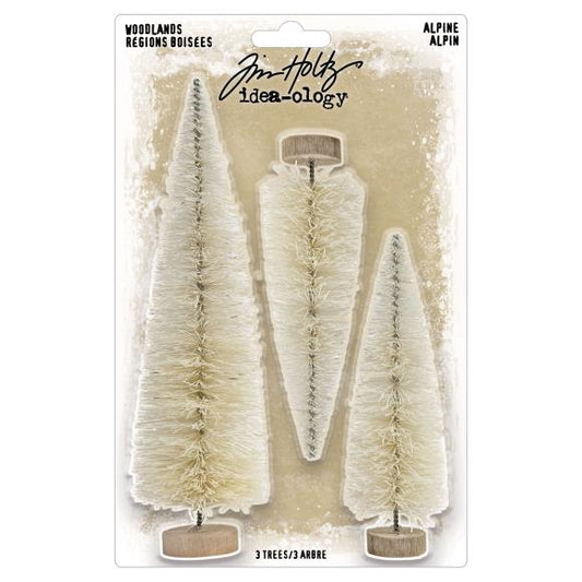 Three decorative trees in a packaging with Tim Holtz Idea-ology branding.