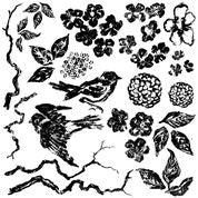 A large decorative stamp from IOD featuring bird and branch designs.