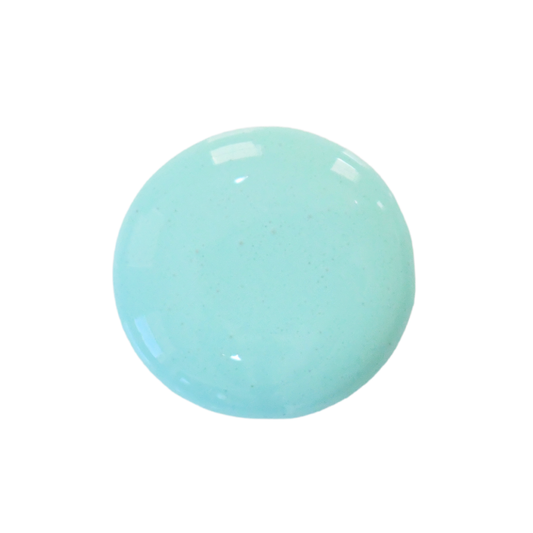 Dollop of blue milk paint on white background to show off the shade of blue.