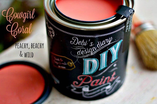 Open can of coral chalk paint by the company "DIY Paint Co."