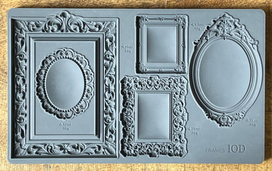 A silicone mold featuring various frame designs for crafting.