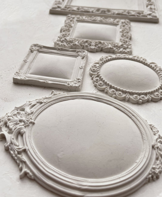 Clay castings of small frames from the IOD mold called "Frames"
