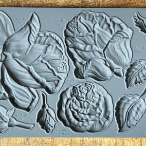A grey-colored IOD Roses mould featuring roses.
