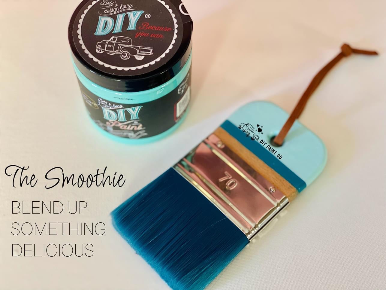 A paintbrush with blue bristles and a brown leather strap, next to a container labeled 'DIY'.